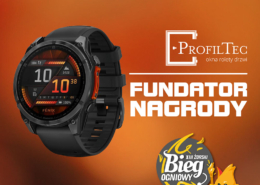 Grafika prezentuje nagrodę w postaci sportowego zegarka, ufundowaną przez firmę ProfilTec, przeznaczoną dla uczestników XIII Żorskiego Biegu Ogniowego na dystansie 5 km.