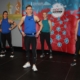 Na zdjęciu cztery instruktorki fintess ćwiczące na siłowni cardio