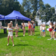 na zdjęciach sportowe aktywności na kąpielisku, stanowisko zdrowotne i zajęcia w basenie