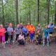 galeria zdjęć przedstawia zajęcia Nordic Walking w terenie, uczestników i ćwiczenia